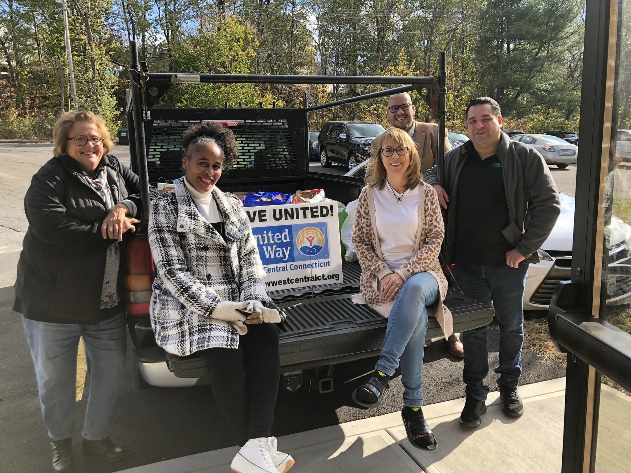 Community group dropping off food donation