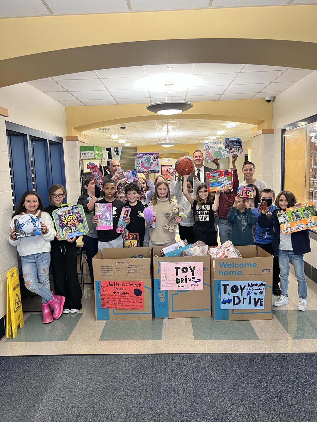 Elementary school students collecting toys for toy drive