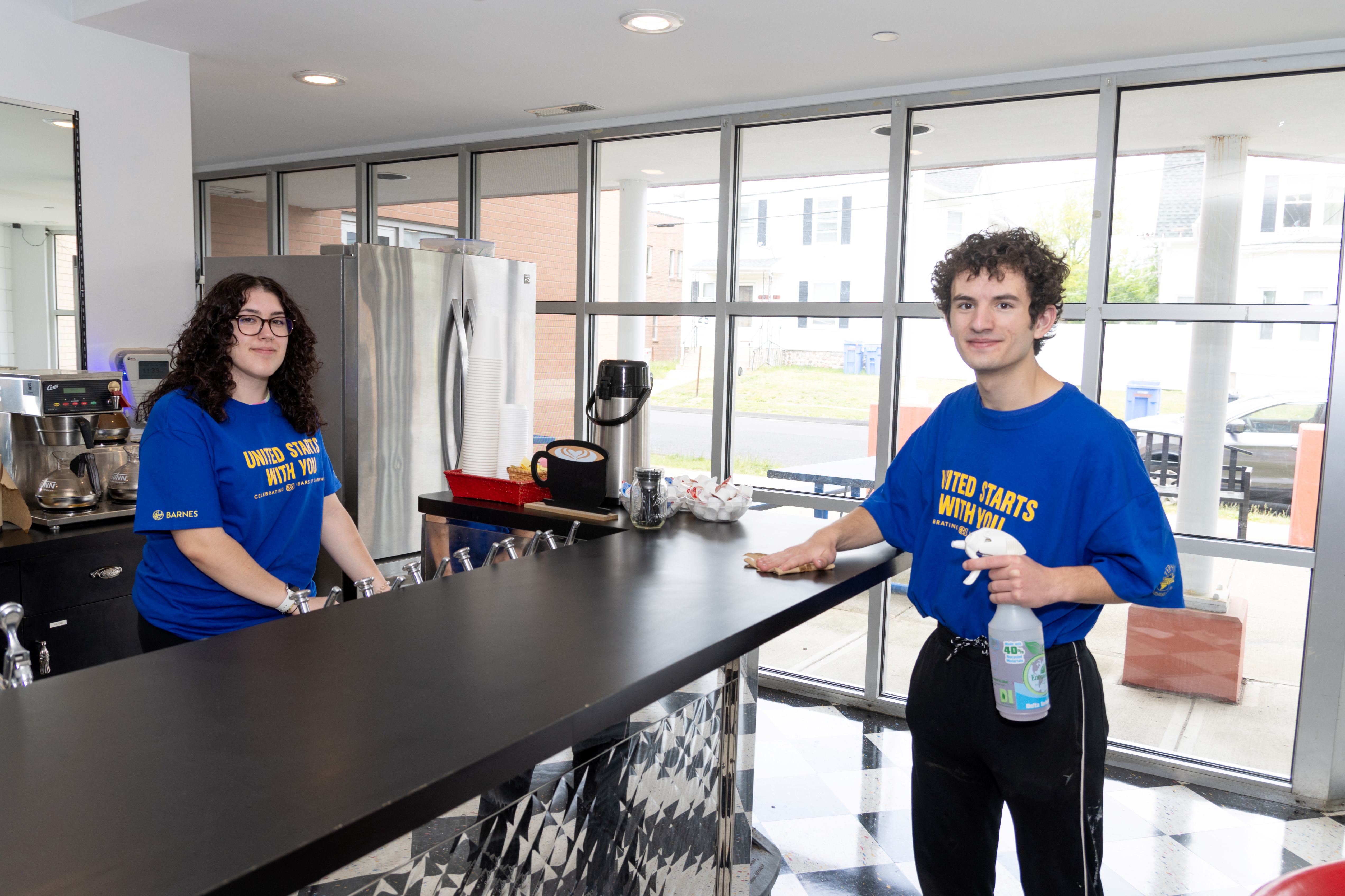 High School Students cleaning at Imagine Nation, A Museum Early Learning Center.