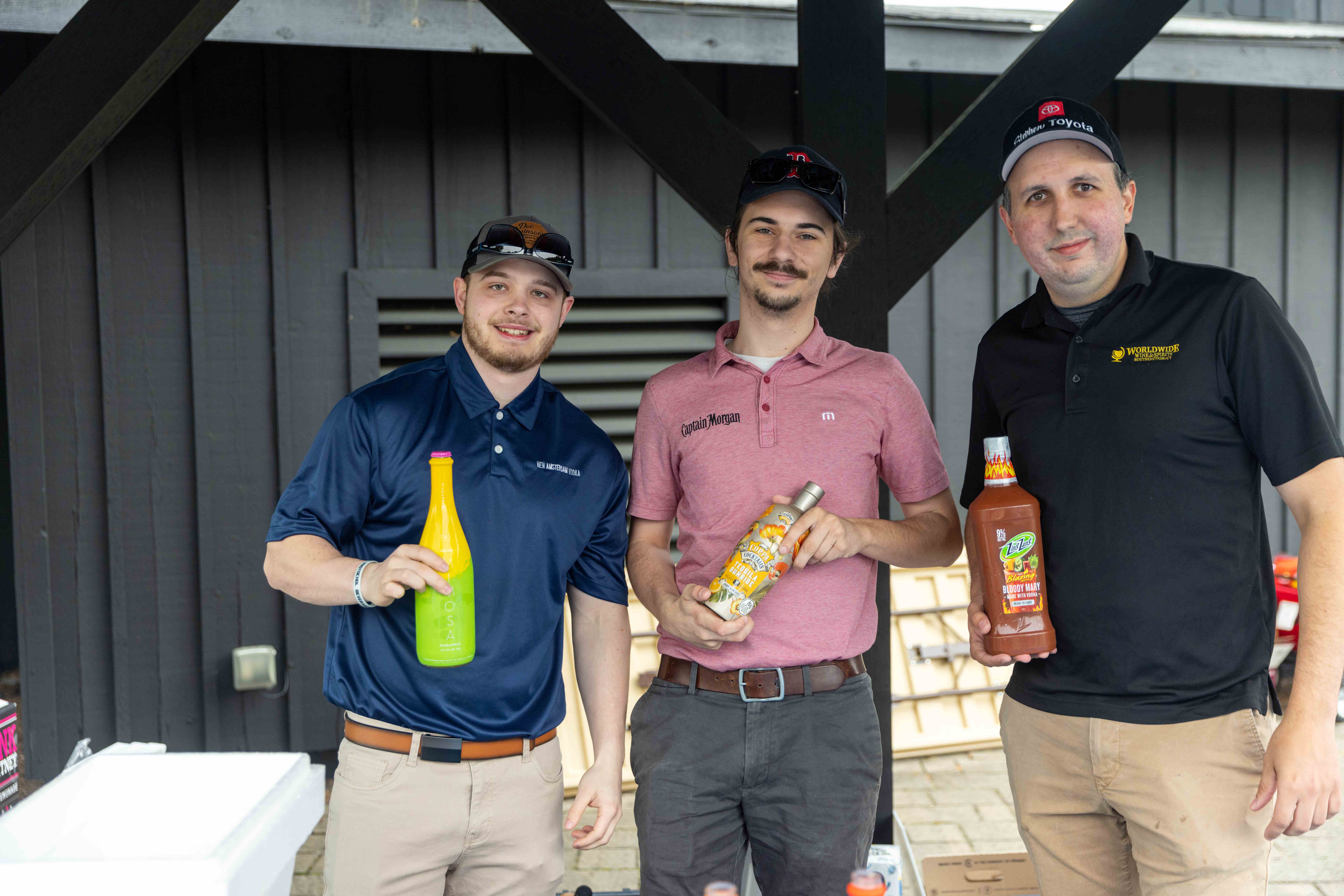 Worldwide Wines & Spirit welcoming golfers with a cocktail.